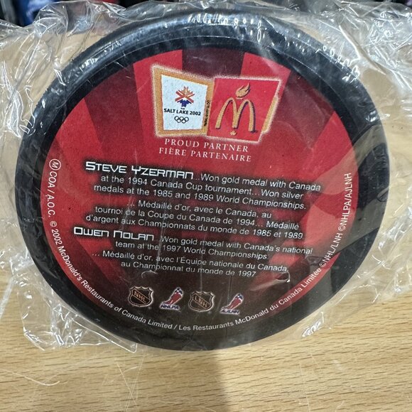Steve Yzerman Owen Nolan 2002 Salt Lake City Olympics Canada Hockey Puck Sealed - Picture 2 of 2
